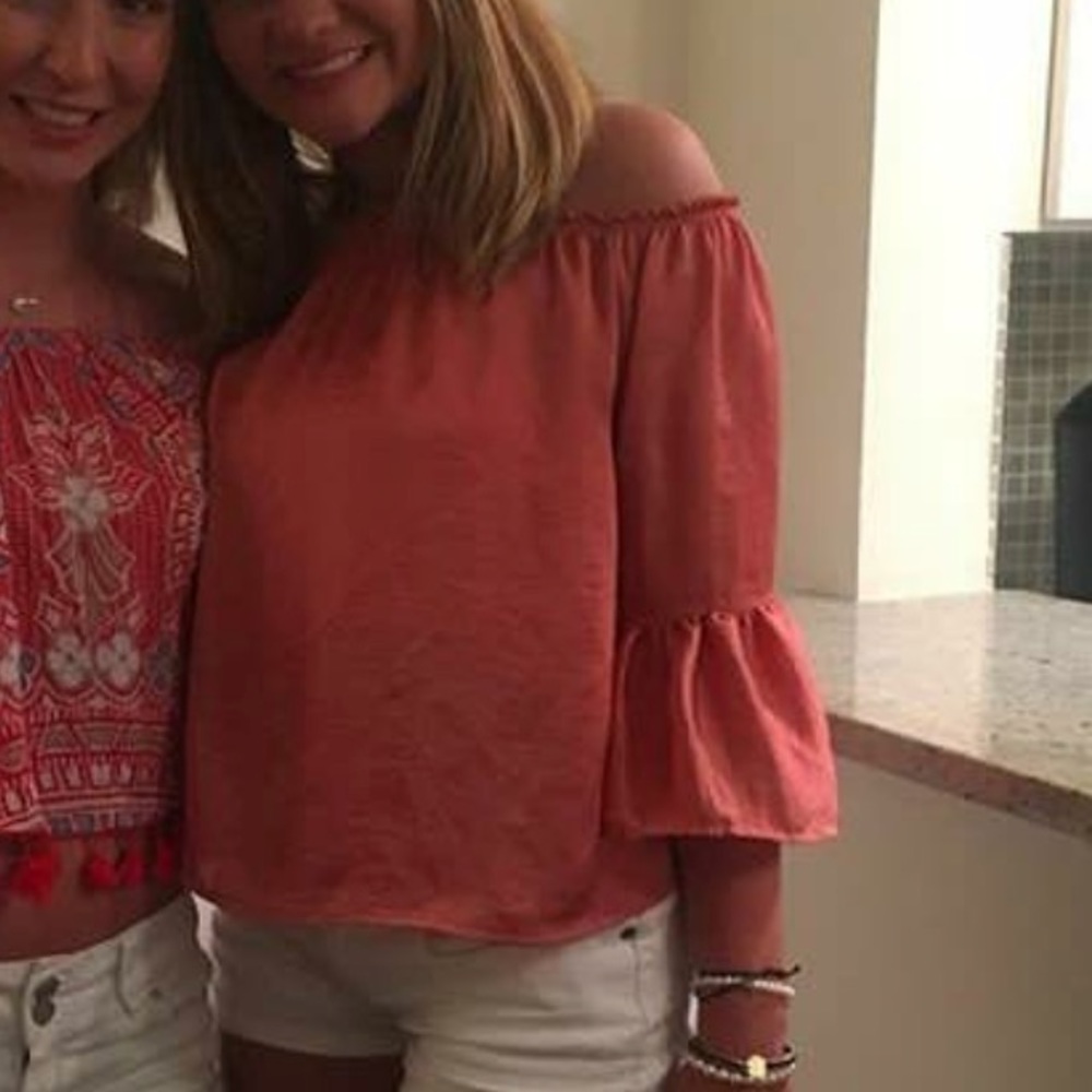 Off the shoulder silk shirt